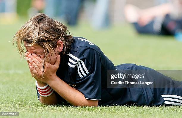 Bianca Rech looks dejected after the Women's Bundesliga match between FC Bayern Muenchen and TSV Crailsheim at the Schoenebuergstadion on June 07,...