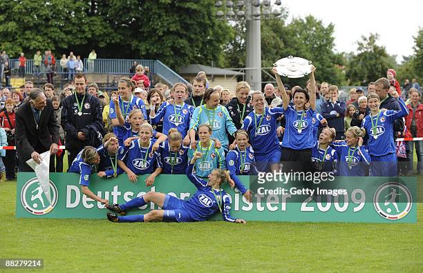 The team of Potsdam celebrateswinning the German titel during the Women Bundesliga match between FFC Turbine Potsdam and VfL Wolfsburg at the...