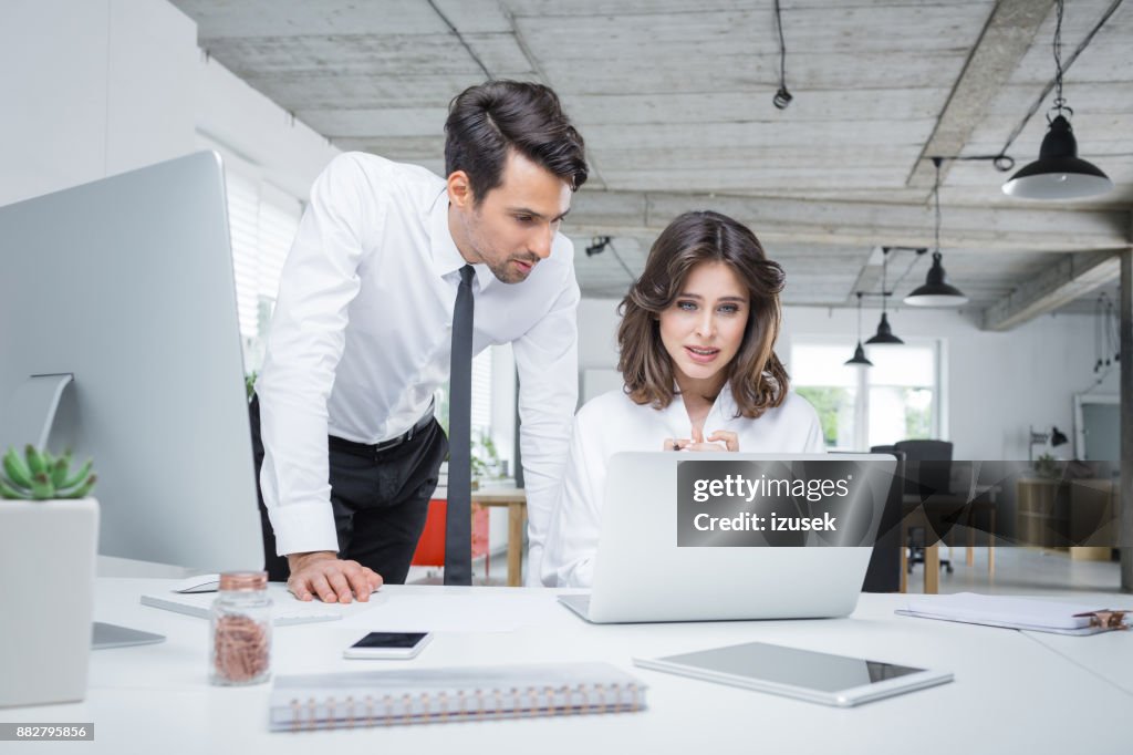 One Working Professional Business Professionals Working Together In Office High-Res Stock Photo ...