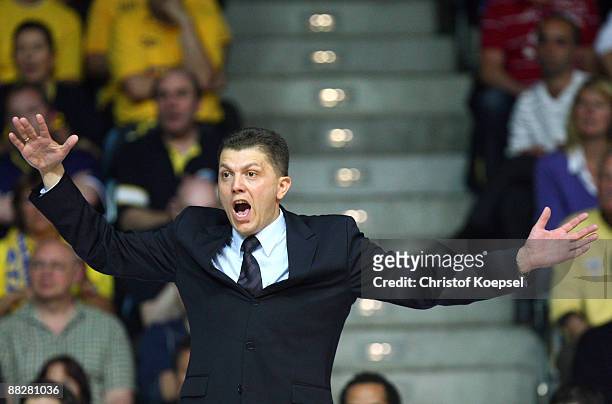 Head coach Predrag Krunic of Oldenburg shouts at his team during the Basketball Bundesliga Play-Off match between EWE Baskets Oldenburg and Brose...