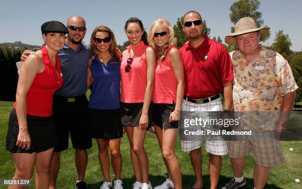 Tournament Director Paula Trickey, Cris Judd, Deal or No Deal Models Patricia Kari, and Katie Cleary and Jack McGee at St. Jude Children's Hospital...