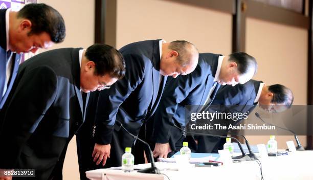 Japan Sumo Association Chairman Hakkaku bows during a press conference after an executive committee meeting at Ryogoku Kokugikan on November 30, 2017...