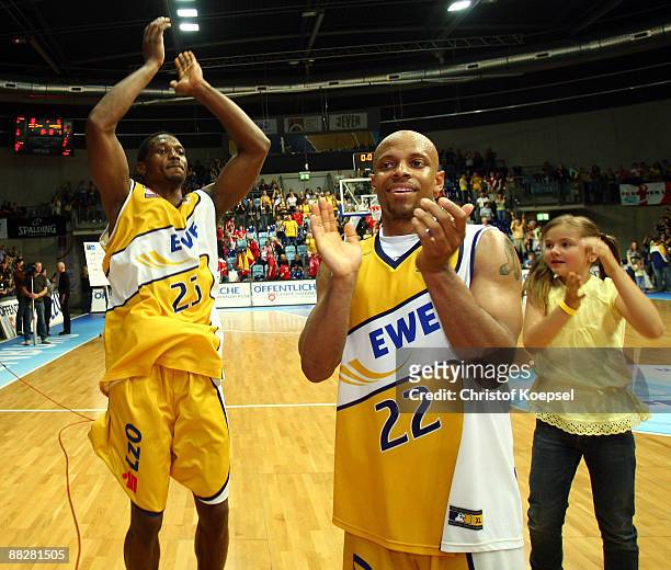 Rickey Paulding and Jason Gardner of Oldenburg celebrate the 88-85 victory and the qualifying for the final after the Basketball Bundesliga Play-Off...