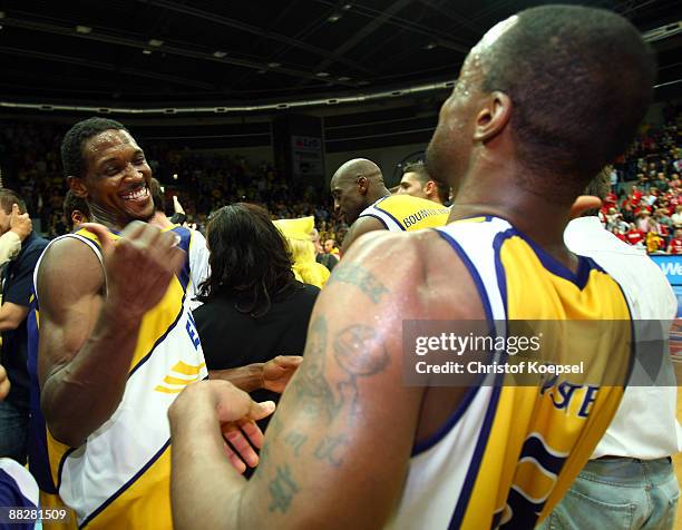 Rickey Paulding of Oldenburg and Je'Kel Foster of Oldenburg celebrate the 88-85 victory and the qualifying for the final after the Basketball...