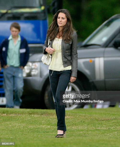 Kate Middleton watches HRH Prince William and HRH Prince Harry compete in The Dorchester Trophy polo match at Cirencester Park Polo Club on June 7,...