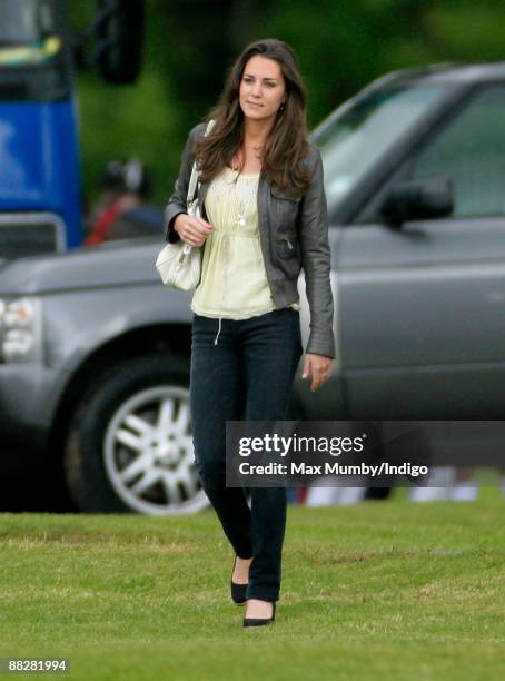 Kate Middleton watches HRH Prince William and HRH Prince Harry compete in The Dorchester Trophy polo match at Cirencester Park Polo Club on June 7,...