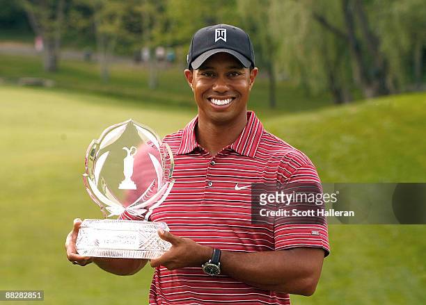 Tiger Woods poses with the trophy after a one-stroke victory at the Memorial Tournament at the Muirfield Village Golf Club on June 7, 2009 in Dublin,...