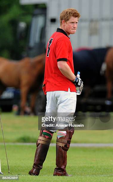 Prince Harry attends a charity polo match at Cirencester Park Polo Club on June 7, 2009 in Cirencester, England.