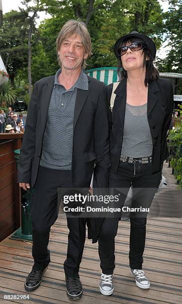 Jean-louis Aubert and Guest attend The French Open 2009 at Roland Garros Stadium on June 7, 2009 in Paris, France.