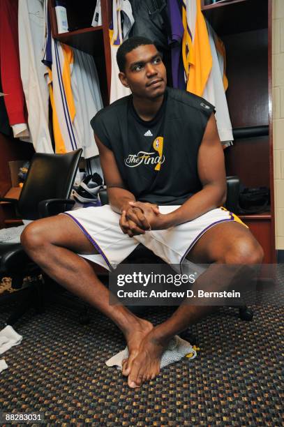 Andrew Bynum of the Los Angeles Lakers sits at his locker prior to playing against the Orlando Magic during Game Two of the 2009 NBA Finals on June...