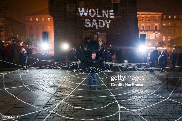 Man dressed as spider with a mask of of Zbigniew Ziobro, Minister of Justice, takes part in a protest at the Main Square against government plans for...