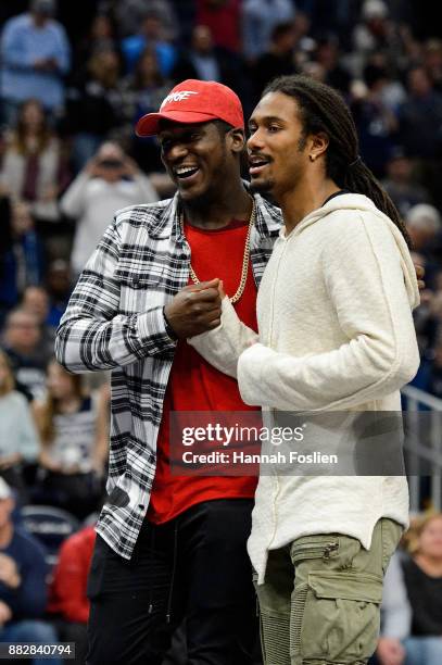 Xavier Rhodes and Trae Waynes of the Minnesota Vikings look on during the game between the Minnesota Vikings and the Los Angeles Rams on November 28,...