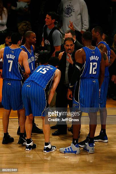 Head coach Stan Van Gundy of the Orlando Magic huddles with his players in overtime against the Los Angeles Lakers in Game Two of the 2009 NBA Finals...