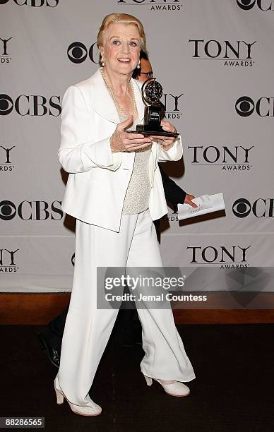 Actress Angela Lansbury, winnerBest Actress by a Featured Actress in a Play, for "Blithe Spirit" poses in the press room at the 63rd Annual Tony...