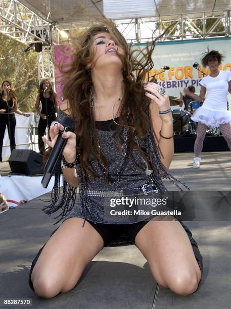 Singer Miley Cyrus performs at the A Time for Heroes Celebrity Carnival Sponsored by Disney benefiting the Elizabeth Glaser Pediatric AIDS Foundation...