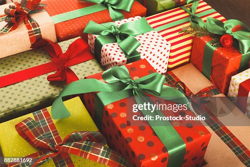 Lots of Gift boxes on wood, christmas presents in paper Lots of Gift boxes on wood, christmas presents in paper