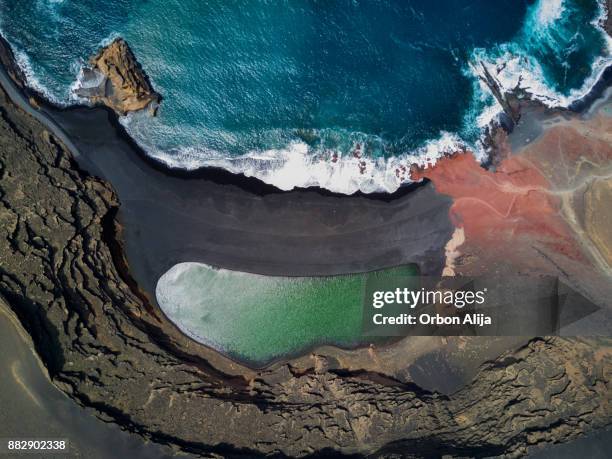 lake of the clicos - lanzarote stock pictures, royalty-free photos & images