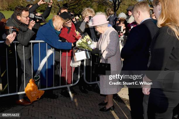 Queen Elizabeth II arrives to the Chichester Theatre while visiting West Sussex on November 30, 2017 in Chichester, United Kingdom.