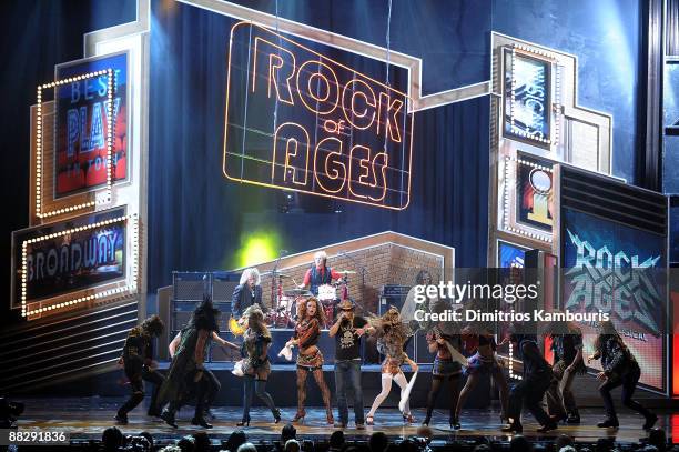 Bret Michaels of Poison performs with the cast of "Rock of Ages" on stage during the 63rd Annual Tony Awards at Radio City Music Hall on June 7, 2009...