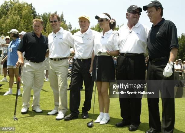 Actors Martin Sheen, Greg Kinnear, Michael Douglas, Catherine Zeta-Jones, James Garner and James Woods pose for the media during the hole-in shootout...
