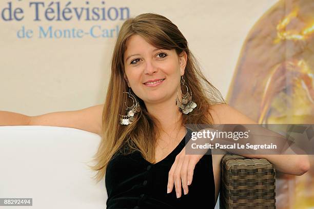 French actress Aurore Pourteyron poses at a photocall for the TV series 'Hero Corp' during the 2009 Monte Carlo Television Festival held at Grimaldi...