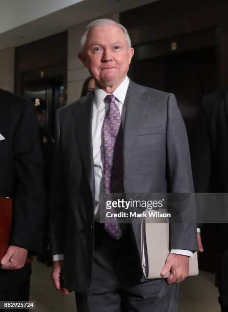 Attorney General Jeff Sessions arrives to appear before a closed door session of the House Intelligence Committee on Capitol Hill, November 30, 2017...