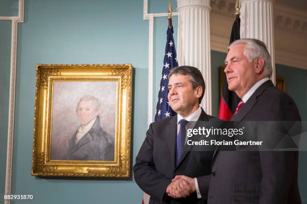 German Foreign Minister Sigmar Gabriel shakes hands with Secretary of State Rex Tillerson on November 30, 2017 in Washington D.C. According to...