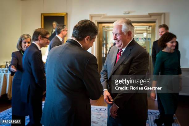German Foreign Minister Sigmar Gabriel talks with Secretary of State Rex Tillerson on November 30, 2017 in Washington D.C. According to reports,...