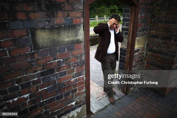 Nick Griffin MEP, leader of The British National Party, poses in his hometown of Welshpool for the media after winning the North West seat in the...