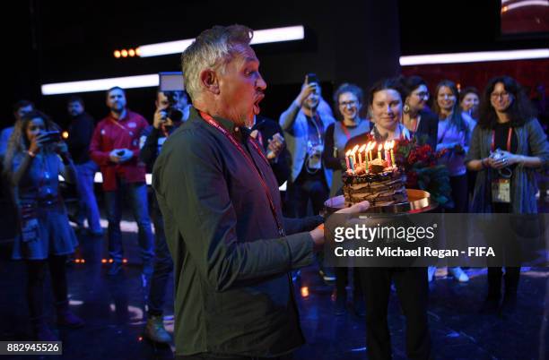 Conductor Gary Lineker receives a birthday cake prior to the 2018 FIFA World Cup Draw the 2018 FIFA World Cup Draw at the Draw hall on November 30,...