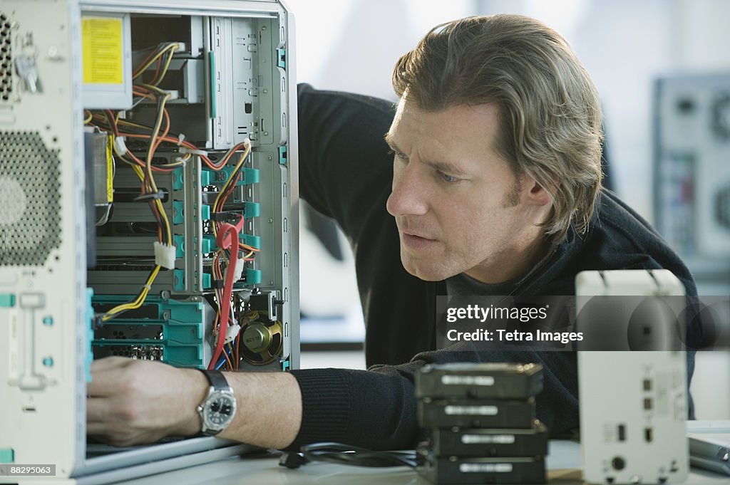 Technician repairing computer