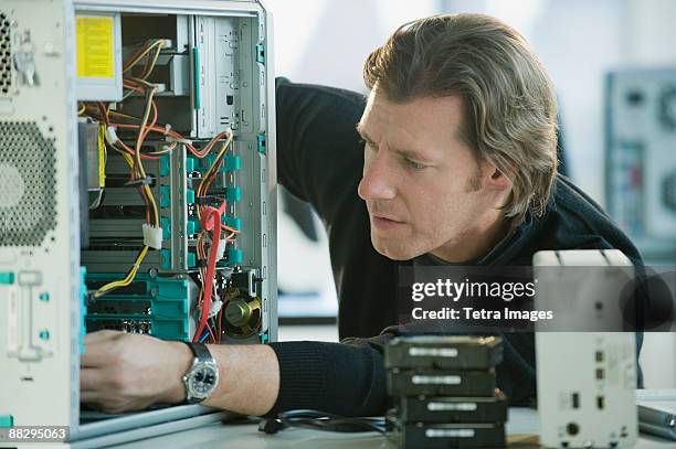 Man Installing Computer 1,244 Installing Computer Systems Stock Photos, High-Res Pictures, and ...