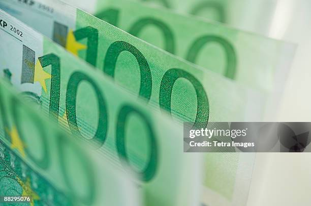 close up of 100 euro notes - one hundred euro banknote stock pictures, royalty-free photos & images