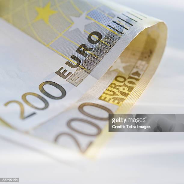 close up of paper euro - two hundred euro banknote stock pictures, royalty-free photos & images