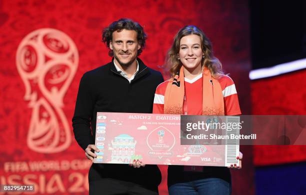 Diego Forlan of Uruguay poses for a photograph with a super fan after the rehearsal for the 2018 FIFA World Cup Draw at the Kremlin on November 30,...
