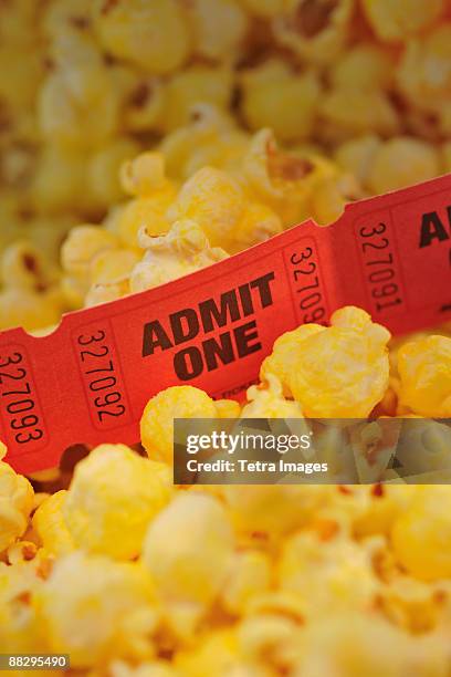 close up of movie tickets and popcorn - popcorn full frame stock pictures, royalty-free photos & images