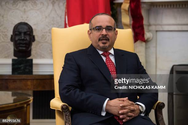 Bahraini Crown Prince Salman bin Hamad al-Khalifa speaks to the press during a meeting with US President Donald Trump in the Oval Office at the White...