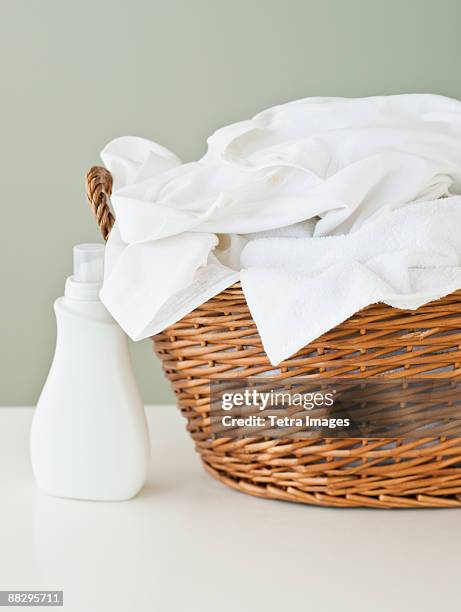 basket of clean laundry - laundry detergent stock-fotos und bilder