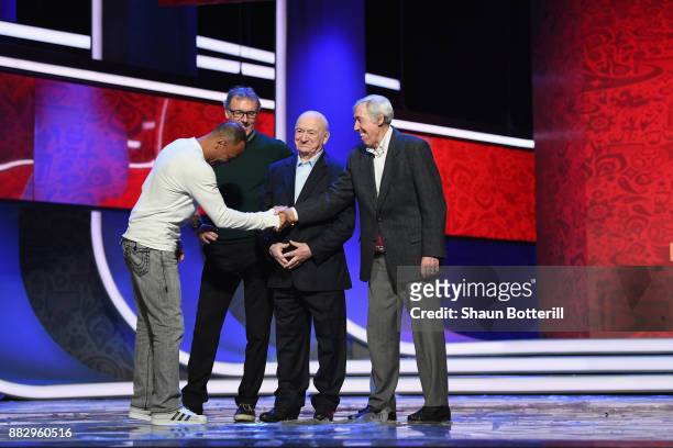 Gordon Banks of England welcomes Cafu of Brazil on the stage after the rehearsal for the 2018 FIFA World Cup Draw at the Kremlin on November 30, 2017...