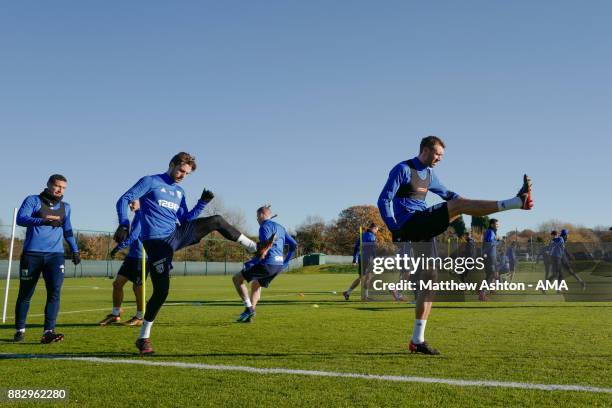 Jay Rodriguez of West Bromwich Albion and Gareth McAuley of West Bromwich Albion during a training session on November 30, 2017 in West Bromwich,...