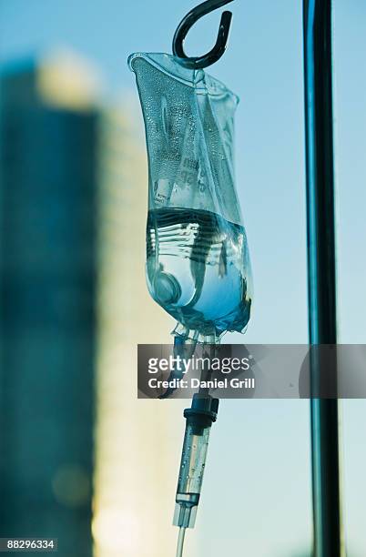 close up of i.v. drip bag - saline drip stock pictures, royalty-free photos & images