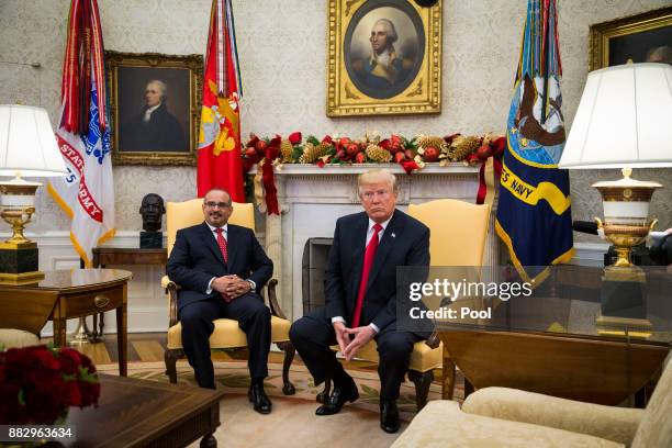 Salman bin Hamad Al-Khalifa, Crown Prince of Bahrain, meets with U.S. President Donald Trump on November 30, 2017 in the Oval Office at the White...