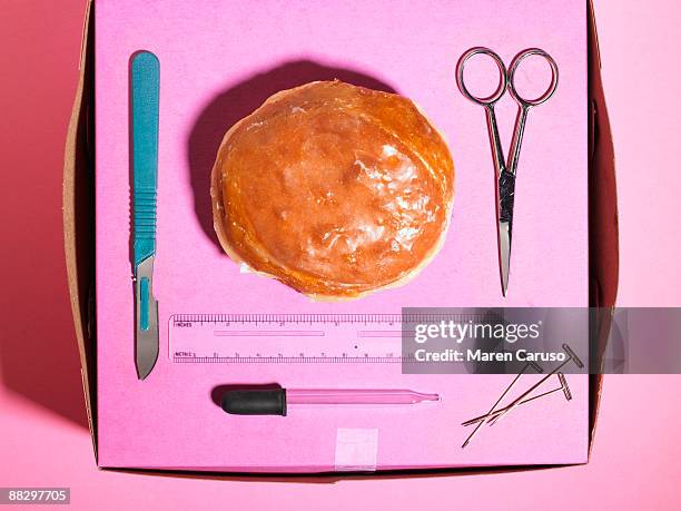 donut dissection - photonica stock pictures, royalty-free photos & images