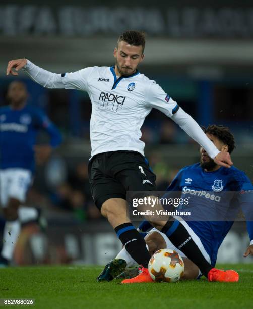 Ashley Williams of Everton brings down Bryan Cristante of Atalanta BC and concedes a penalty during the UEFA Europa League group E match between...