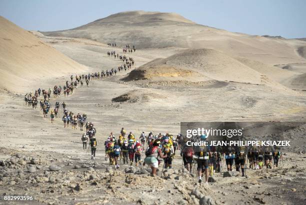 Competitors take part in the third stage during the first edition of the Marathon des Sables Peru, between Samaca and Ocucaje, in the Ica desert, on...