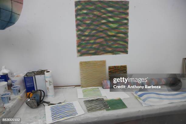 View of a table of art works and equipment in Mike Solomon's Long Island studio, East Hampton, New York, August 10, 2011.