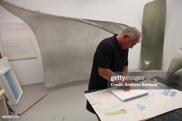 View of American artist Mike Solomon as he sketches in his Long Island studio, East Hampton, New York, August 10, 2011.