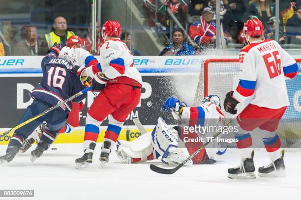 Backman of USA, Pavel Koledov of Russia, Alexander Yeryomenko of Russia and Ilya Mikheyev of Russia battle for the ball during the Deutschland Cup...