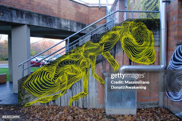 View of the mural painted by AweR on the wall of civic center in Bologna suburbs for the project Zona Navile-Gorki 6.16 on November 30, 2017 in...