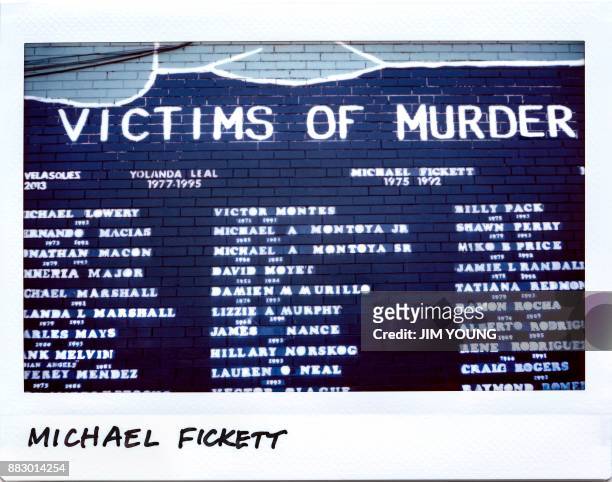 Michael Fickett,17-year-old, is remembered on a mural for victims of murder in the 2700 block of 47th street in Chicago, Illinois on September 20,...